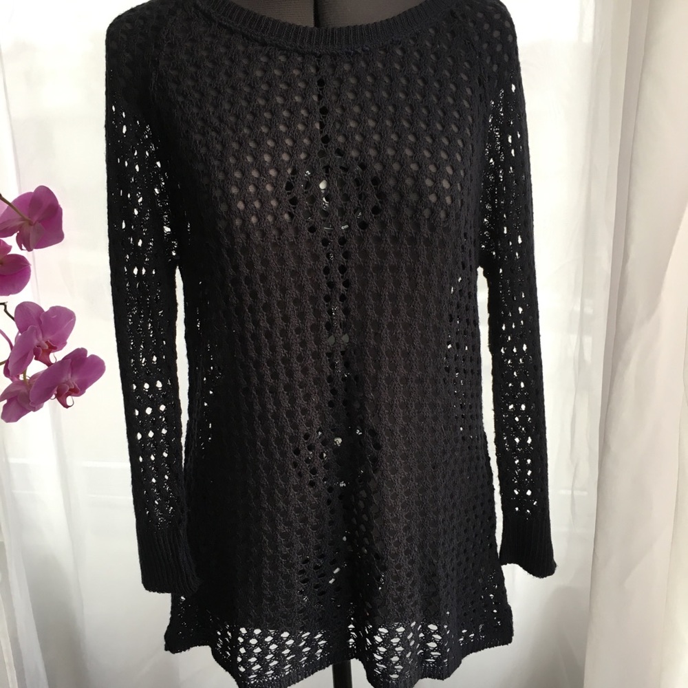 Loose knit midnight blue sweater. Coastal quiet luxury